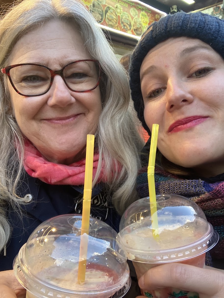 Authentic Marrakech Food Tour - two women enjoying Moroccan panache drink in Marrakech